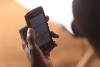 User interacting with the ExCiteS Data Collector