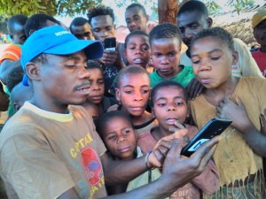 Soumbou teaches a group of youth