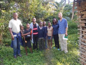 Simeon (far left), Samuel (stripy t-shirt), myself (far right), and a Baka family